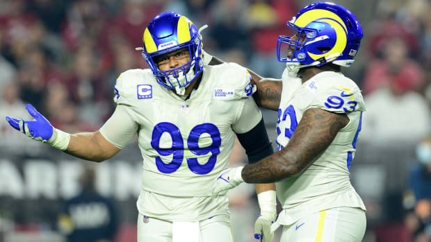 Aaron Donald gestures after sacking Kyler Murray on Monday Night Football